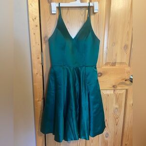 Emerald green dress with pockets and lace up back